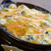 Oven-Baked Creamy Crab Dip · A classic creamy crab dip comes together with a mixture of lump crab meat, cream cheese, and...