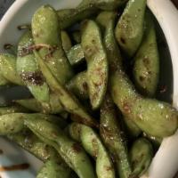 Edamame · Boiled green soy beens.