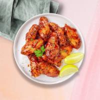 Hot Shot Sweet Wings · Breaded or naked fresh chicken wings, fried until golden brown, and tossed in honey & hot sa...