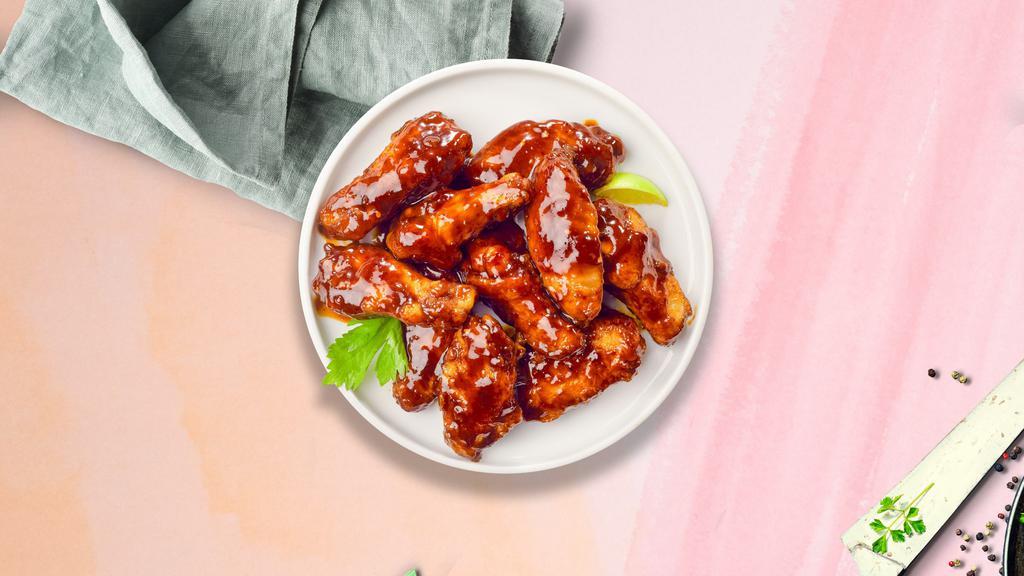 Bbq Blizzard Wings · Breaded or naked fresh chicken wings, fried until golden brown, and tossed in barbecue sauce. Served with a side of ranch or bleu cheese.