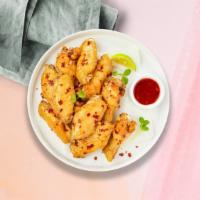 Sweet & Spicy Combo Boneless Wings · Boneless breaded fresh chicken wings, fried until golden brown, and tossed in sweet and sour...