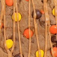Reeses Madness · A peanut butter cookie with Reese’s Pieces
and Reese’s Cups baked into this peanut
butter ov...