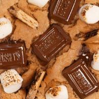 Leave You Wanting Smore · Remember summer camp? Now you can with
this Graham Cracker, Hershey’s chocolate
and marshmal...