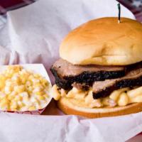 The Mac Attack (Regular) · Brisket covered with Mac-N-Cheese.