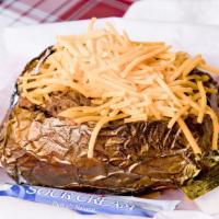 The Smacked Down Potato · Large baked potato with chopped meat, Cheddar cheese, sour cream, butter, and chives.
