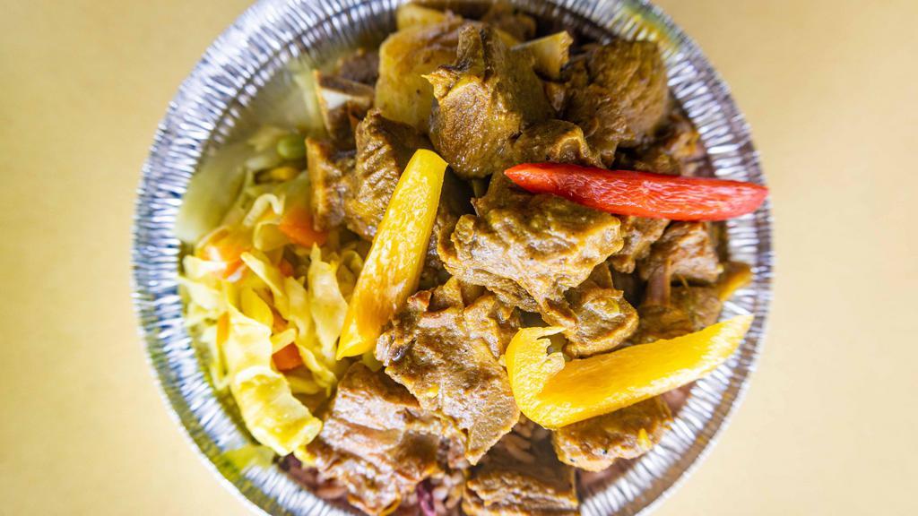Small Curry Goat · serve with rice and peas or white rice and steam cabbage
