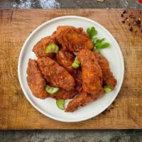 Cruisin' Cluckin' Wings · Breaded and fried chicken wings with our blend of spices. Served with ranch or blue cheese.