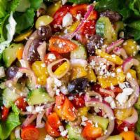 Greek Salad · Lettuce, tomatoes, cucumbers, red onions, olives, feta cheese, pepperoncini, and Greek dress...