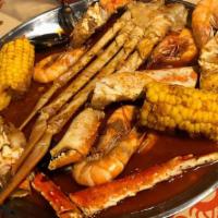 Seafood Combo · Mix and match 1/2 lb seafood boils (Minimum 2 items | Comes with 1 corn and 1 potato per lb)