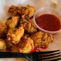 Fried Oyster Basket (10) · (Comes with your choice of regular fries or cajun fries, and tartar sauce)