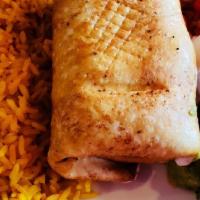 Chimichanga · A large flour tortilla rolled with your preference and lightly deep fried. Served with refri...