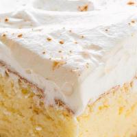 Tres Leches De La Casa · Moist sponge cake infused in three milks (condensed, evaporated and whole milk). Topped with...