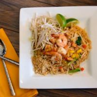 Pad Thai · Signature thai noodle stir fried with a choice of meat, bean curd, crushed roasted peanuts, ...