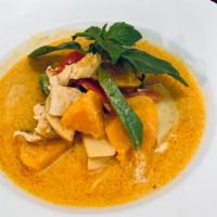 Red Curry Chicken With Butternut Squash · Sliced chicken breast, butternut squash, bamboo shoot, bell pepper and basil simmered in cre...