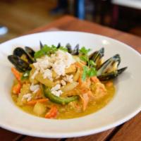 Yellow Curry Seafood · Wok stir-fried shrimp, squid, scallop, mussel, onion, carrot, bell pepper, and in yellow cur...
