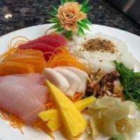 Sashimi Deluxe · 16 pieces assorted raw fish with rice. Raw fish. Consuming raw or undercooked meat, poultry,...