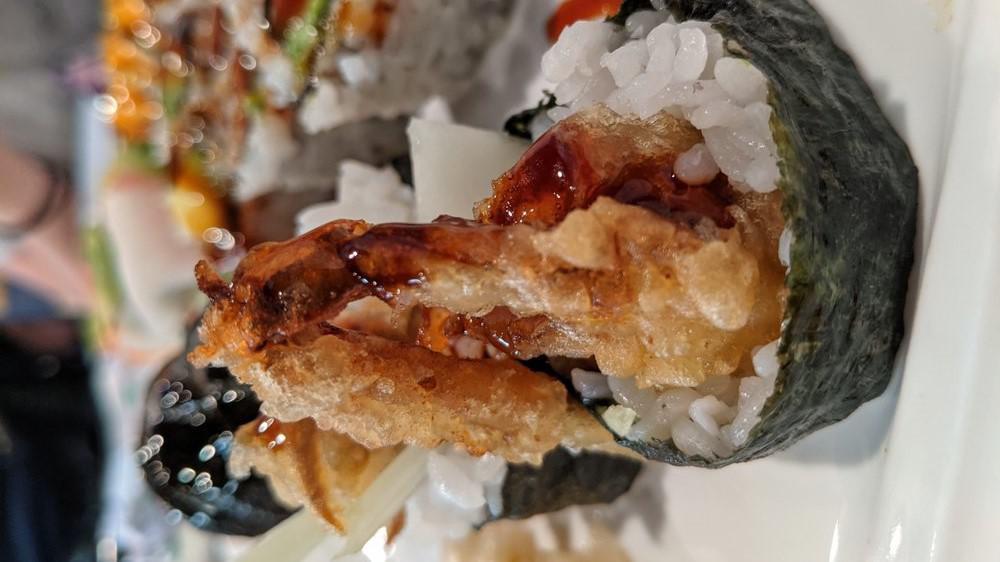 Spider Roll (5) · Soft shell crab, cucumber and with eel sauce.