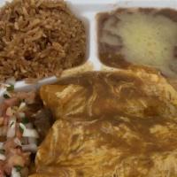 Enchiladas · 3 Chicken or Beef fajita enchiladas served with Mexican rice and refried beans.