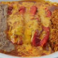 #6) Enchiladas Lunch Plate · 1. Three beef, chicken, or cheese enchiladas, rice, and beans.