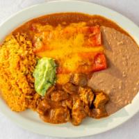 #11) Texas Plate · 1. Two cheese enchiladas, a portion of carne guisada, rice, beans, guacamole, and two homema...