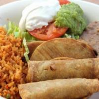 #17) Flautas De Pollo Lunch Plate · Chicken flautas. Rice, beans, salad, guacamole, and sour cream.