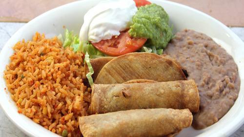 #17) Flautas De Pollo Lunch Plate · Chicken flautas. Rice, beans, salad, guacamole, and sour cream.