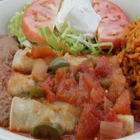 #20) Soft Tacos Lunch Plate · 1. Three corn tortilla Chicken or beef tacos, smothered with salsa ranchera, rice, beans, sa...