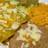 Enchiladas Verdes · 3 Grilled chicken enchiladas covered with our house green sauce served with rice, beans guac...