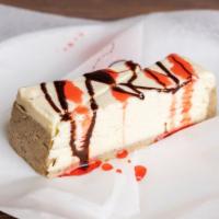 Cheesecake · One slice of our famous cheesecake topped with caramel sauce and fresh whipped cream.