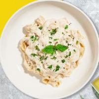 Alfredo Of Impasta · Classic alfredo sauce based pasta cooked with grilled chicken, pesto, and fresh fettuccine.
