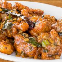 Chili Chicken Tikka · Chicken tikka stir-fried in indo-chinese sauce with onions, chilies and peppers.