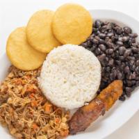 Pabellon · Shredded beef served with black beans, white rice and sweet plantains.