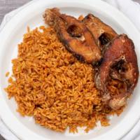 Jollof Rice · Rice cooked in a rich tomato based sauce.