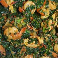Efo Riro Soup · Mixed spinach simmered in tomato stew