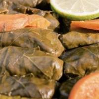 Yaprak Sarma (Stuffed Grape Leaves) · Home made grape leaves stuffed with rice, pine nuts,  currants and Turkish seasonings.