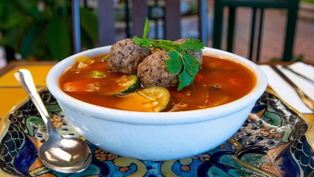 Albondiga Soup · Ground beef meatballs in broth with fresh carrots, squash, potatoes & celery. Served with rice and choice of tortillas
