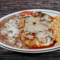 Chile Rellenos · Two egg battered California long chile peppers stuffed with Monterey Jack cheese and topped ...