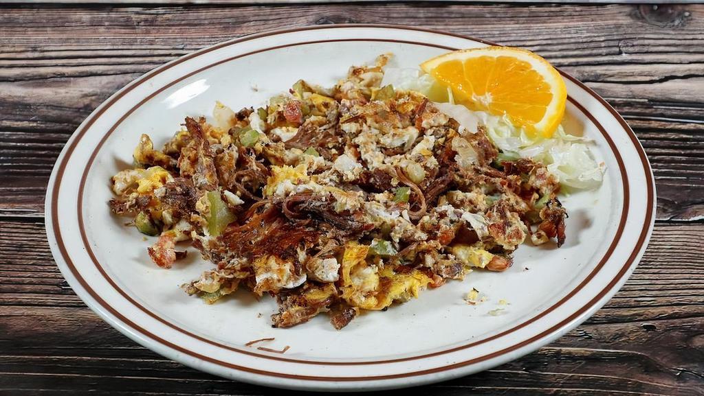 Machaca · Shredded beef mixed with. scrambled eggs, pico de gallo,. bell pepper and onion
