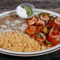 Fajitas De Camaron · (8) large shrimp, bell peppers, onions, tomatoes with a light sauce