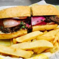 Spin Lomo Sub · Delicious Lomo Saltado in a sub. Comes with a side of fries or yuca, and our yellow, green a...