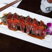 *Pepper Tuna Tataki · Black pepper tuna with chef special sauce.
