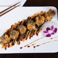 Sakura · Shrimp tempura, cucumber, Cream cheese inside. Top with spicy shrimp tempura, eel sauce, and...