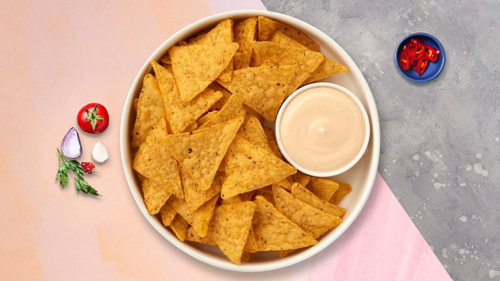 Queso Mucho & Chips · Homemade melted cheese dip with warm tortilla chips.
