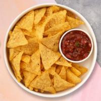 Salsa Dip & Chips · Warm up with toasty tortilla chips served with a side of tangy salsa.