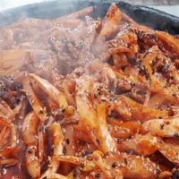 Ojing Uh Bokk Um · Spicy stir fried squid.