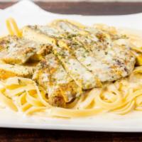 Chicken Alfredo · Homemade Alfredo topped with grilled chicken over fettuccine noodles.