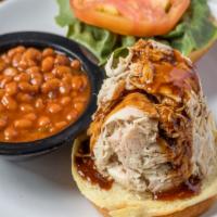Pulled Rotisserie Chicken Sandwich · Served with jaco sauce.