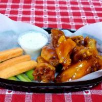 Honey Hot Wings · 8 Medium heat. Jumbo Bone-in wings, served with ranch or blue cheese, carrots, and celery.