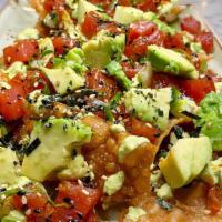 Ahi Tuna Poke Nachos · ginger-sesame ahi tuna poke, wonton crisps, avocado, togarashi, cucumber, pico de gallo