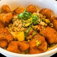 Spicy Citrus Cauliflower Bowl · spicy citrus glazed cauliflower, vegetable fried rice, chopped peanuts